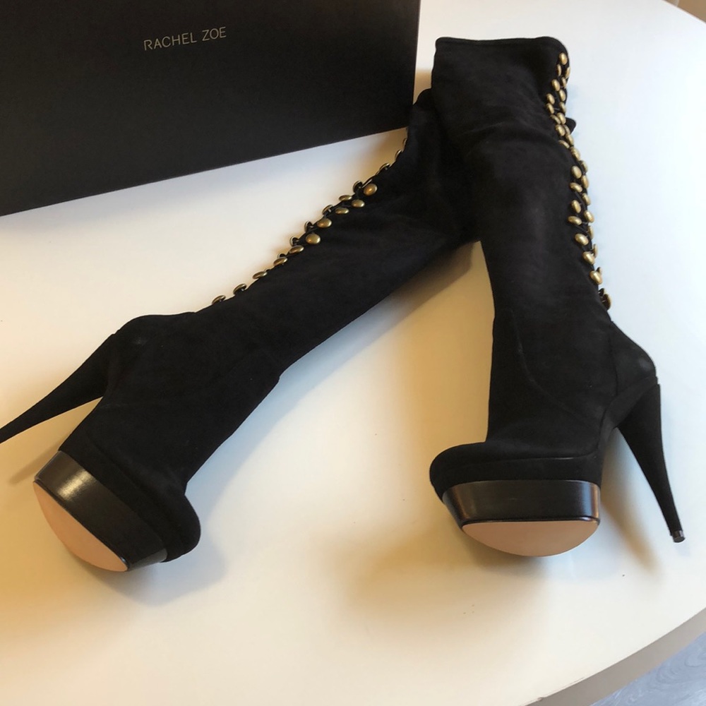 “Brigitte” thigh-high platform boots.